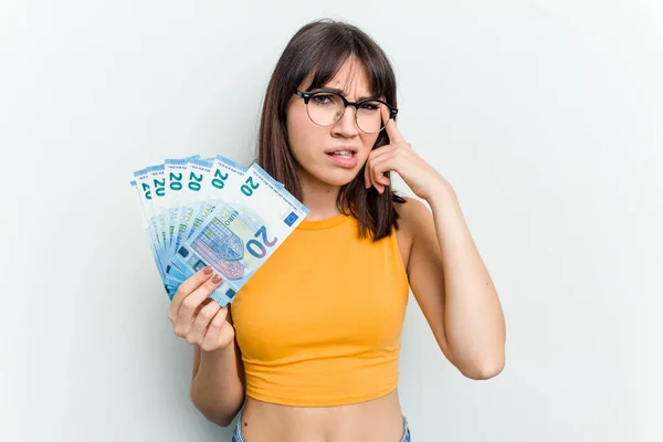 Young Caucasian Woman Holding Banknotes Isolated Blue Background Showing Disappointment — Stock Photo, Image