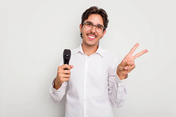 Young Hispanic Singer Man Isolated White Background Joyful Carefree Showing — Stock Photo, Image