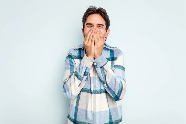 Young Hispanic Man Isolated Blue Background Laughing Something Covering Mouth — Stock Photo, Image