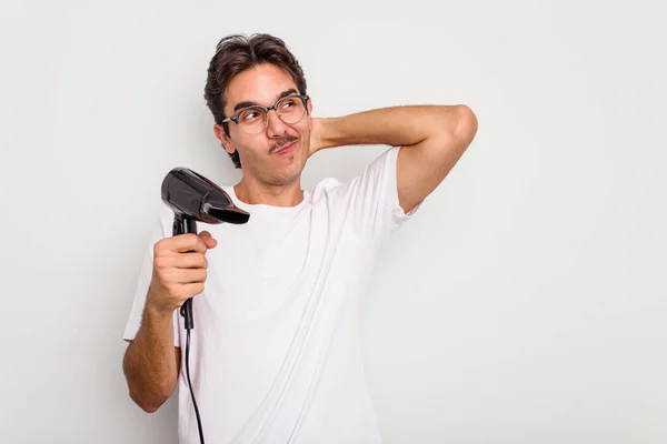 Young Hispanic Man Holding Hairdryer Isolated White Background Touching Back — Stock Photo, Image