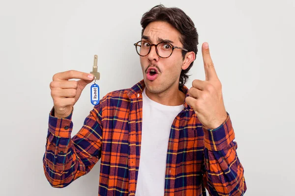 Young Hispanic Man Holding Home Keys Isolated White Background Having — Stock Photo, Image