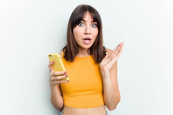 Young Caucasian Woman Using Mobile Phone Isolated White Background Surprised — Stock Photo, Image