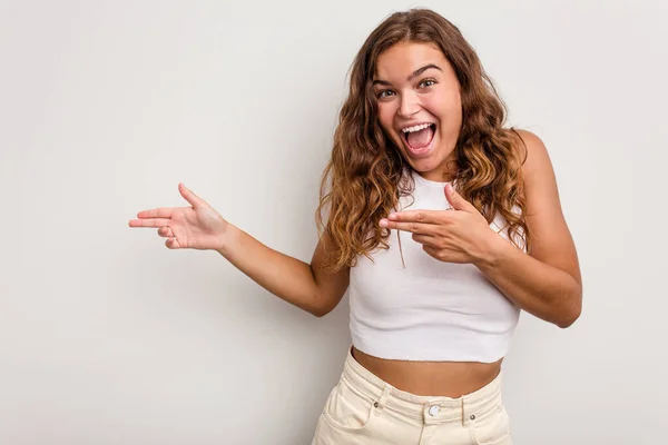 Young Caucasian Woman Isolated Blue Background Excited Pointing Forefingers Away — Stock Photo, Image