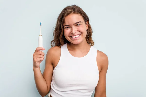 Young Caucasian Woman Holding Electric Toothbrush Isolated Blue Background Happy — Stock Photo, Image