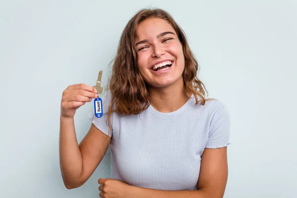 Young Caucasian Woman Holding Home Keys Isolated Blue Background Laughing — Photo