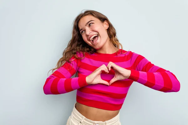 Young Caucasian Woman Isolated Blue Background Smiling Showing Heart Shape — Stock Photo, Image