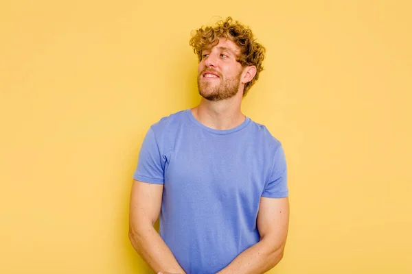 Young Caucasian Man Isolated Yellow Background Relaxed Happy Laughing Neck — Stock Photo, Image