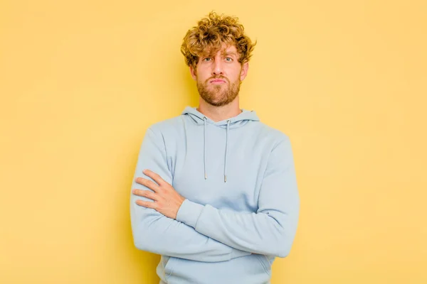 Young Caucasian Man Isolated Yellow Background Unhappy Looking Camera Sarcastic — Stock Photo, Image