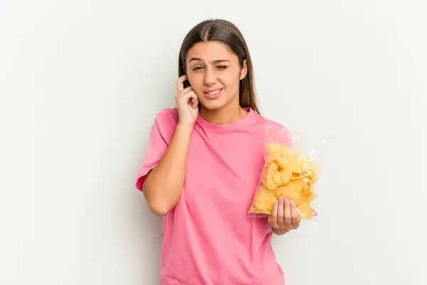 Young Indian Woman Holding Crips Isolated White Background Covering Ears — Stock Photo, Image