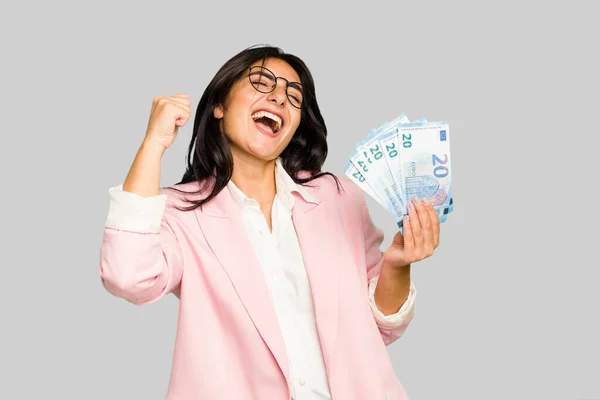 Young Business Indian Woman Holding Banknotes Isolated Raising Fist Victory — Stock Photo, Image