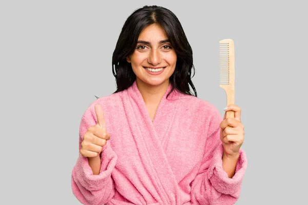 Young Woman Bathrobe Holding Hair Comb Isolated Smiling Raising Thumb — Stock Photo, Image