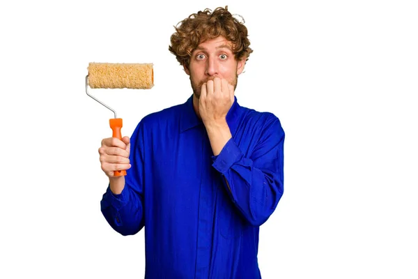 Young Painter Man Holding Roll Isolated White Background Biting Fingernails — Stock Photo, Image