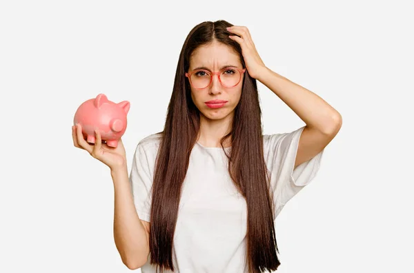 Young Caucasian Woman Holding Piggy Bank Isolated Being Shocked She — Stock Photo, Image
