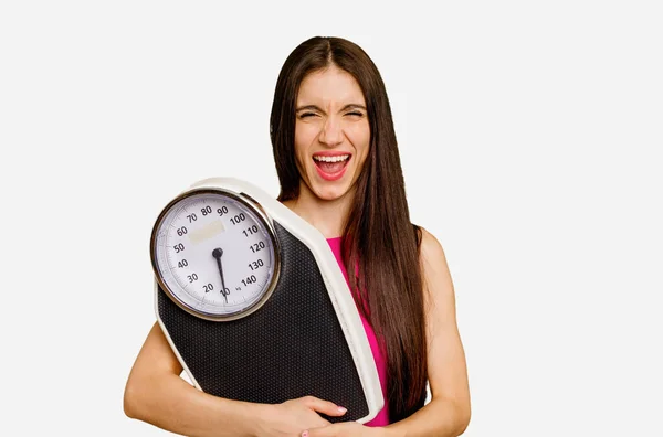 Young Caucasian Woman Holding Scale Isolated Screaming Very Angry Aggressive — Stock Photo, Image