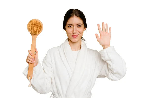 Young Caucasian Woman Holding Shower Brush Isolated Smiling Cheerful Showing — Stock Photo, Image