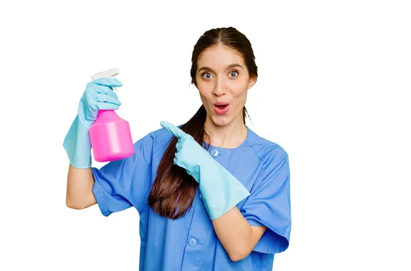 Young Cleaner Caucasian Woman Isolated Pointing Side — Stock Photo, Image