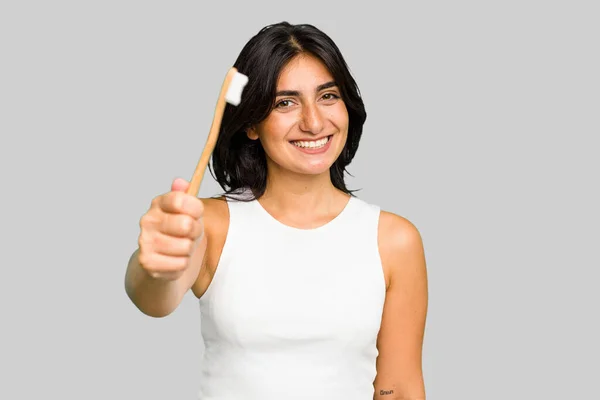 Young Indian Woman Holding Toothbrush Isolated — Stock Photo, Image