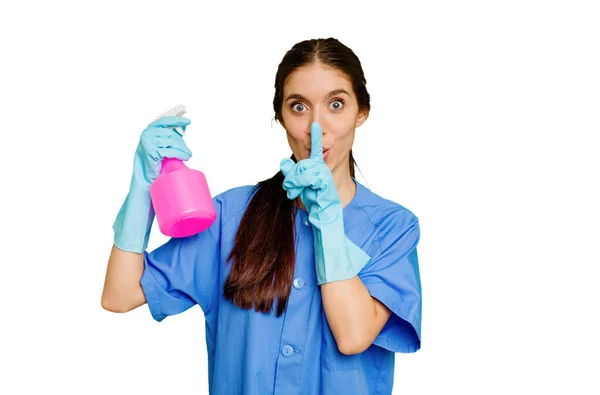 Young Cleaner Caucasian Woman Isolated Keeping Secret Asking Silence — Stock Photo, Image