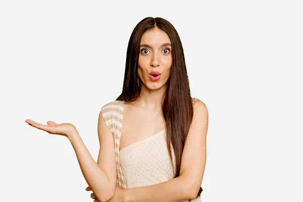 Young Caucasian Long Hair Woman Isolated Impressed Holding Copy Space — Stock Photo, Image
