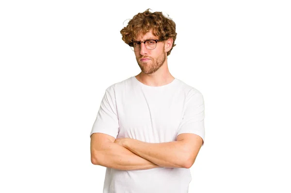 Young Caucasian Man Isolated Green Chroma Background Suspicious Uncertain Examining — Stock Photo, Image