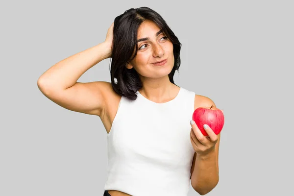 Young Indian Woman Holding Apple Healthy Lifestyle Isolated Touching Back — Stock Photo, Image