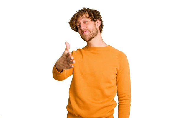 Young Caucasian Man Isolated Green Chroma Background Stretching Hand Camera — Stock Photo, Image