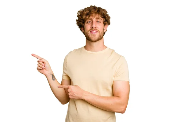 Young Caucasian Man Isolated Green Chroma Background Excited Pointing Forefingers — Stock Photo, Image