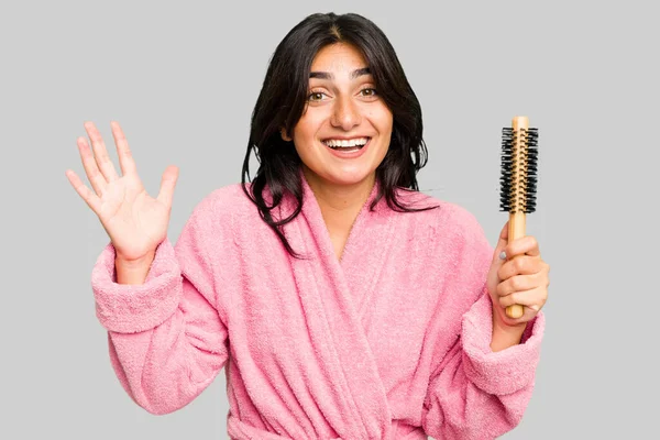 Young Indian Woman Bathrobe Holding Hairbrush Isolated Receiving Pleasant Surprise — Stock Photo, Image