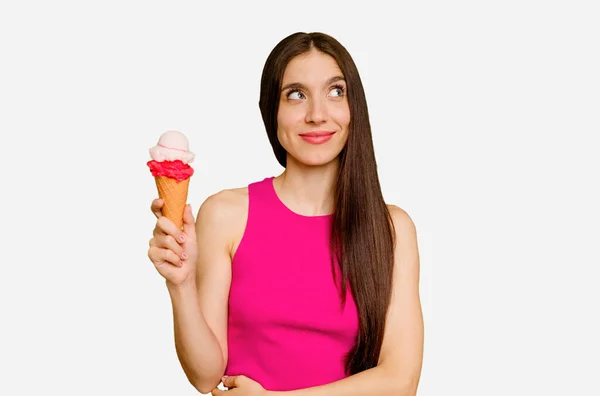 Young Caucasian Woman Eating Ice Cream Isolated Dreaming Achieving Goals — Stock Photo, Image