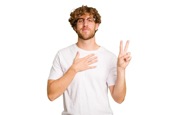 Young Caucasian Man Isolated Green Chroma Background Taking Oath Putting — Stock Photo, Image