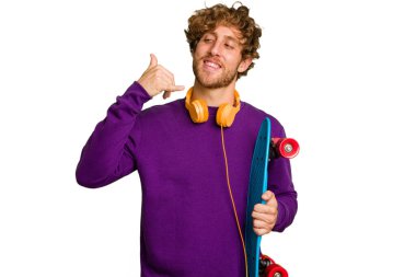 Young skater caucasian man isolated on white background showing a mobile phone call gesture with fingers.