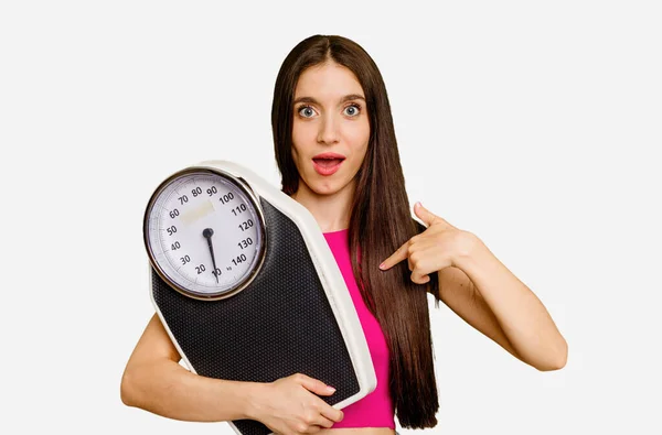 Young Caucasian Woman Holding Scale Isolated Person Pointing Hand Shirt — Stock Photo, Image