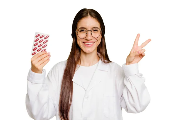Young Pharmacist Woman Holding Tablet Pills Isolated Joyful Carefree Showing — Stock Photo, Image
