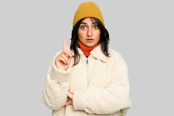 Young Indian Woman Wearing Winter Jacket Wool Cap Isolated Having — Stock Photo, Image