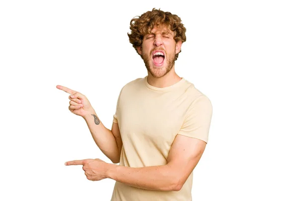 Young Caucasian Man Isolated Green Chroma Background Pointing Forefingers Copy — Stock Photo, Image