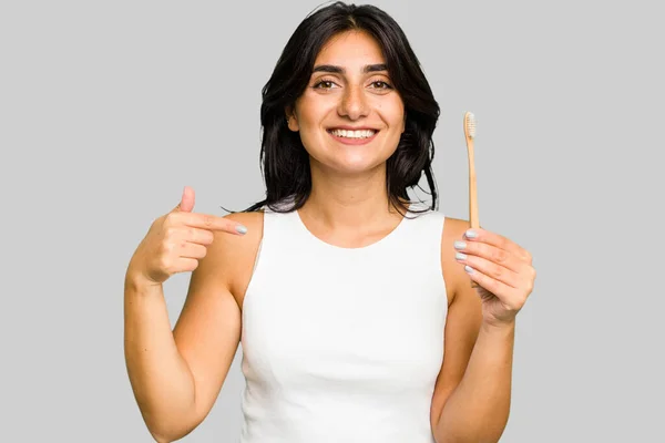 Young Indian Woman Holding Toothbrush Isolated Person Pointing Hand Shirt — Stock Photo, Image