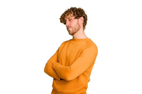 Young Caucasian Man Isolated Green Chroma Background Suspicious Uncertain Examining — Stock Photo, Image