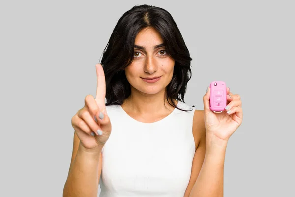 Young Indian Woman Holding Car Keys Isolated Showing Number One — Stock Photo, Image