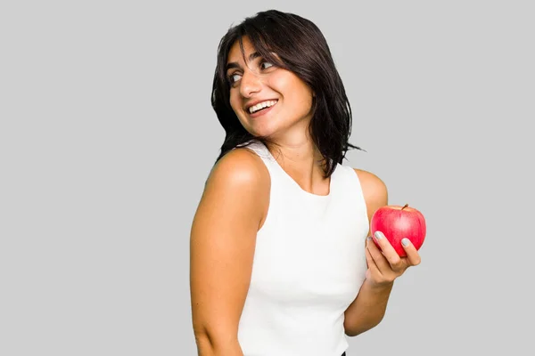 Young Indian Woman Holding Apple Healthy Lifestyle Isolated Looks Aside — Stock Photo, Image