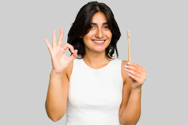 Young Indian Woman Holding Toothbrush Isolated Cheerful Confident Showing Gesture — Stock Photo, Image