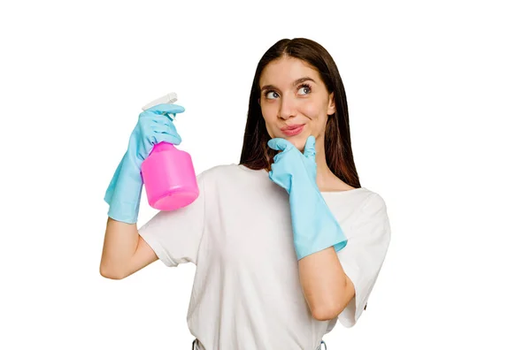 Young Cleaner Woman Isolated Looking Sideways Doubtful Skeptical Expression Stock Image