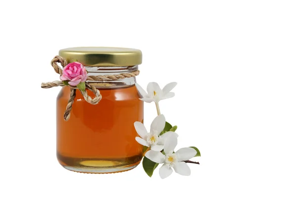 Sweet honey in jar isolated on white — Stock Photo, Image