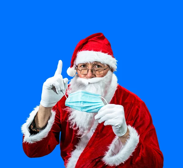 Der Weihnachtsmann Erklärt Die Bedeutung Einer Medizinischen Maske Während Der — Stockfoto