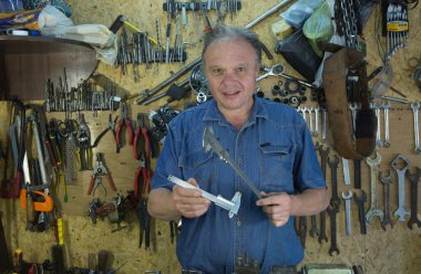 Working with a caliper. Master's hands at work. Home workshop