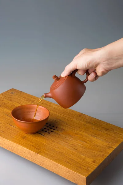 Hand Person Pouring Tea Traditional Ceramic Cup Oriental Tea Parties — стоковое фото