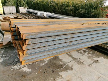 Steel channel on a construction site. The use of steel channel to strengthen the foundation of the house in a construction site.