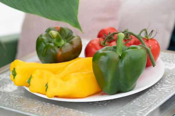 Healthy food green bell pepper, red tomatoes and yellow sweet pepper. High quality photo