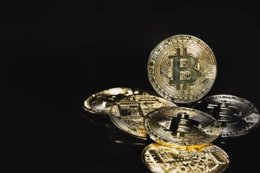 Bitcoin business future coin currency exchange isolated in black background.