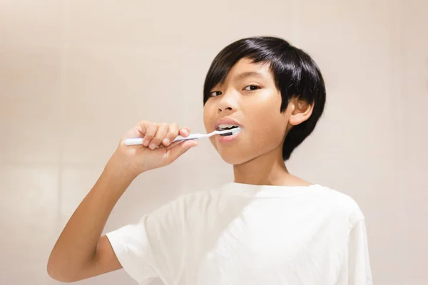 Boy Brushing His Teeth Toothbrush Bathroom — Stock fotografie