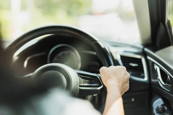 Close Woman Driving Hand Holding Steering Wheel Blur Background — 图库照片